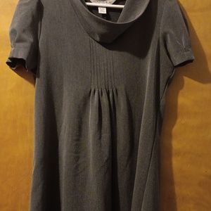 Gray dress. Knee lengthed.